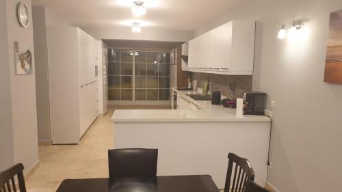 Køkken eller tekøkken på Villa Sunrise