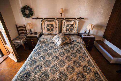 a bedroom with a large bed with a large rug at Seaside Mikiverna Cozyhome in Kalyves Poligirou