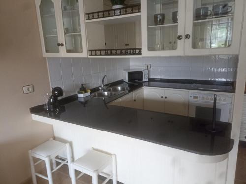 Η κουζίνα ή μικρή κουζίνα στο Piso Ortigueira Centro