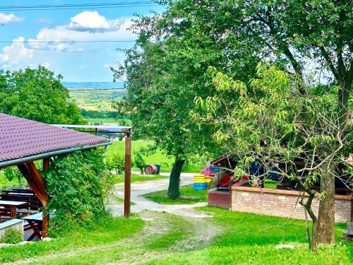 Taman di luar Szent Orbán Panzió - Kutyabarát apartmanok