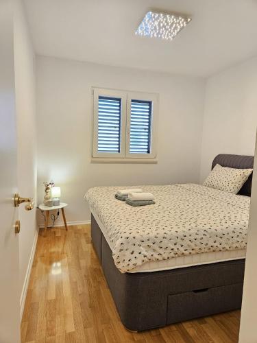 Postel nebo postele na pokoji v ubytování Apartman Beach Makarska