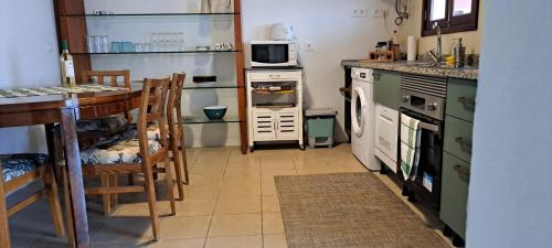 Kuchyň nebo kuchyňský kout v ubytování Quinta das Pitaias, Casa de Baixo