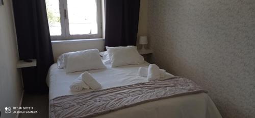 Ένα ή περισσότερα κρεβάτια σε δωμάτιο στο Liber Guest House
