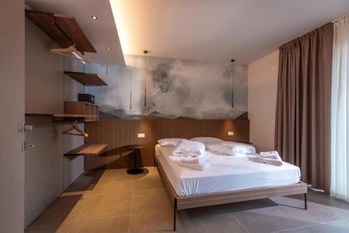 Ένα ή περισσότερα κρεβάτια σε δωμάτιο στο Residence Paradise