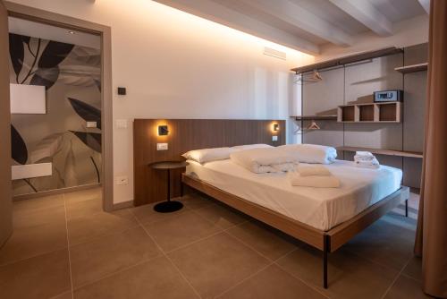 Ένα ή περισσότερα κρεβάτια σε δωμάτιο στο Residence Paradise