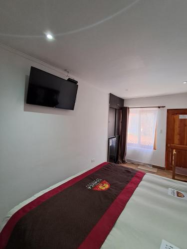 Postel nebo postele na pokoji v ubytování Hostal Illauca de Atacama
