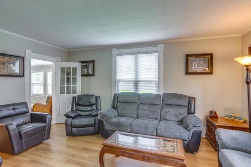 a living room with a couch and two chairs at Welcoming Port Clinton Vacation Rental! in Port Clinton