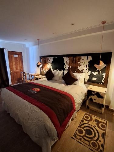Postel nebo postele na pokoji v ubytování Hostal Illauca de Atacama