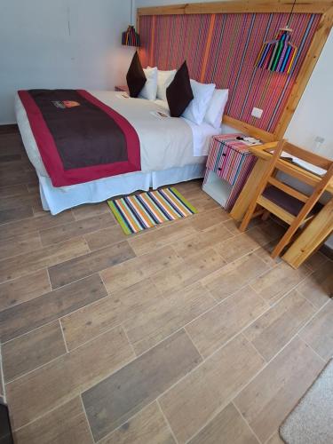 Postel nebo postele na pokoji v ubytování Hostal Illauca de Atacama