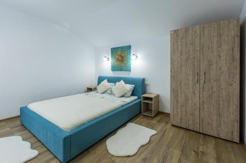 Postel nebo postele na pokoji v ubytování Casa Lya