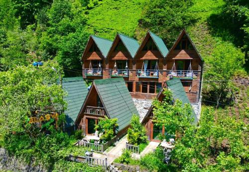 an overhead view of a house in the woods at ELASYA BUNGALOV in Rize