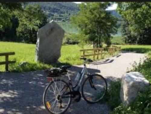 a bike parked on the side of a path at LAGO MAGGIORE COUNTRY STUDIO in Mercallo