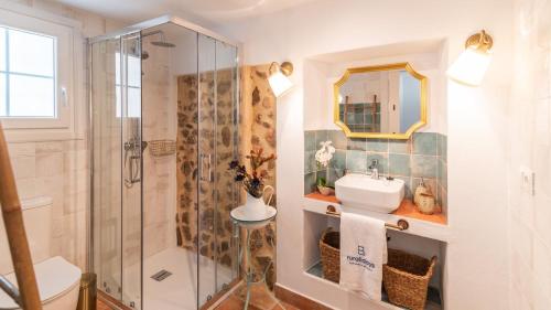 a bathroom with a shower and a sink at Rubito el Olmo Villanueva de la Concepción by Ruralidays in Villanueva de la Concepción