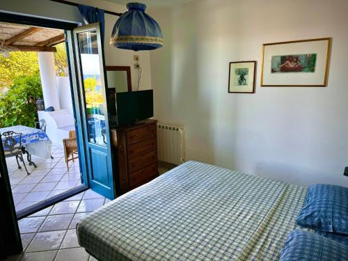 Ένα ή περισσότερα κρεβάτια σε δωμάτιο στο Villa 'A Pisa