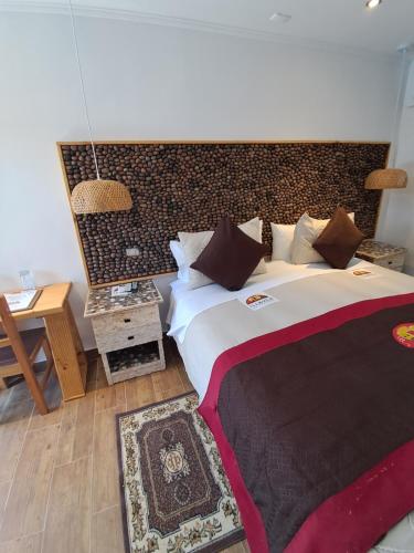 Postel nebo postele na pokoji v ubytování Hostal Illauca de Atacama
