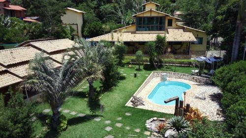 an aerial view of a house with a swimming pool at Pousada Luar in Santana do Riacho