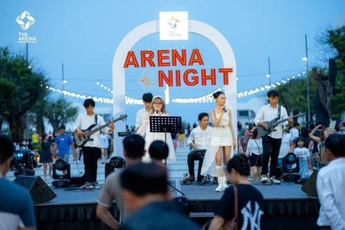 a group of people playing music on a stage at Khách sạn The arena Nha Trang in Thôn Hòa Ða