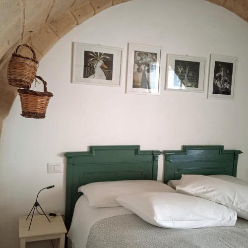 Ένα ή περισσότερα κρεβάτια σε δωμάτιο στο IL Borgo Antico b&b