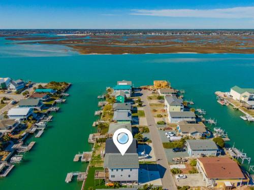 an aerial view of a marina with a lot of houses at Sunset Nonsense in Topsail Beach