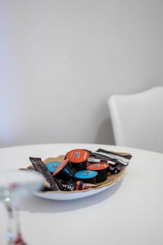 a plate of tools on a white table at Finikas Suites & Apartments Airport By Airstay in Artemida