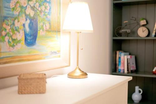 a lamp sitting on top of a white table at Villa Dida Hvar in Hvar