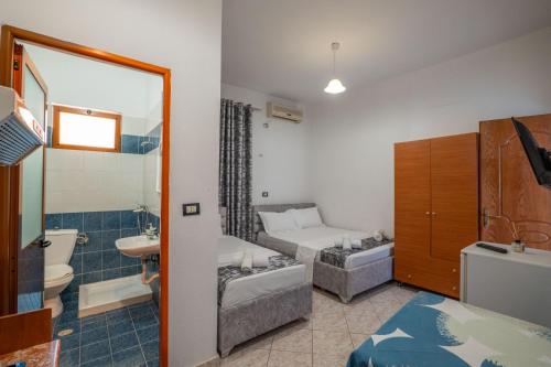 Koupelna v ubytování Hotel Vila Vilson