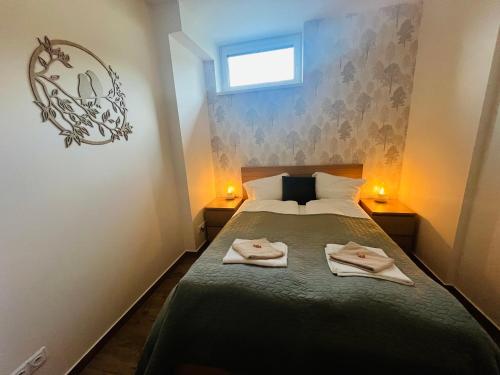 Postel nebo postele na pokoji v ubytování Apartmán pod Špičákem