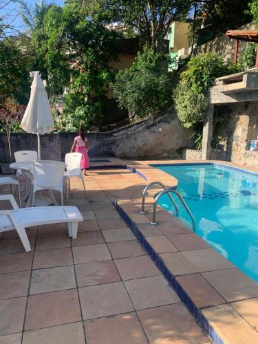 Bazén v ubytování Casa praia dos anjos com piscina nebo v jeho okolí