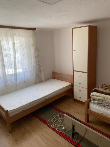 Postel nebo postele na pokoji v ubytování Kuca u Prokuplju