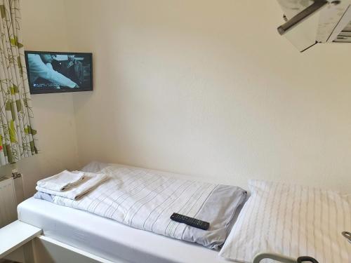 Ένα ή περισσότερα κρεβάτια σε δωμάτιο στο Aparthotel Jonas