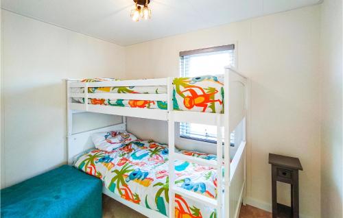 Ένα ή περισσότερα κρεβάτια σε δωμάτιο στο 3 Bedroom Lovely Home In Scherpenisse