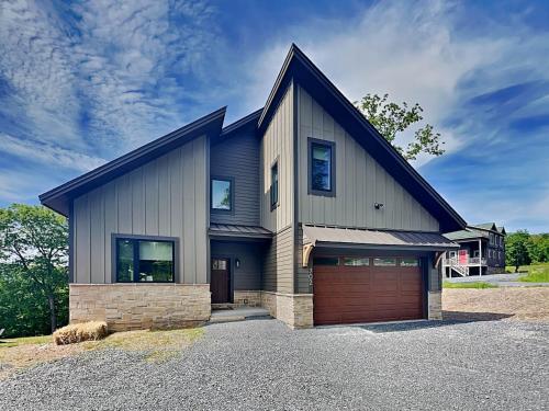 a large house with a garage at Heavenly Summit in McHenry