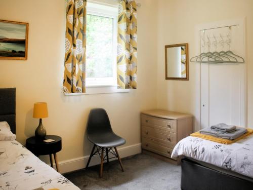 Postel nebo postele na pokoji v ubytování Riversdale Cottage