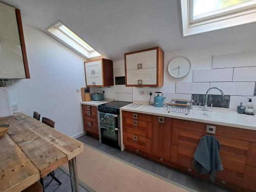 Kuchyň nebo kuchyňský kout v ubytování Symonds Yat Cottage