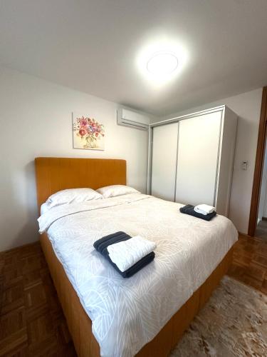 Llit o llits en una habitació de Vila Mariam&Maid