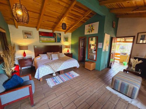 Postel nebo postele na pokoji v ubytování Villas De Los Pinos 2