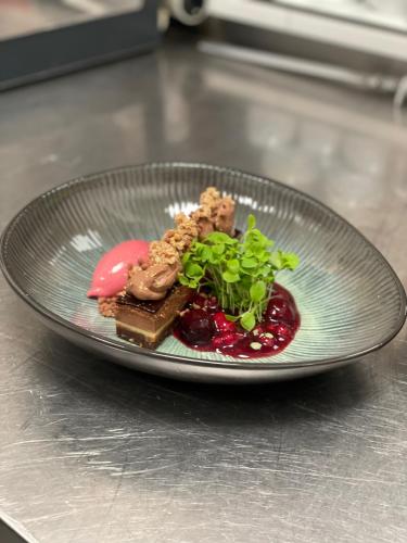 a plate of food on top of a counter at Gasthaus Neue Mühle in Westhausen
