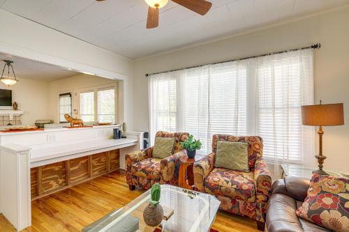a living room with a couch and a table at Main Street Home 1 Mile to Callaway Gardens in Pine Mountain