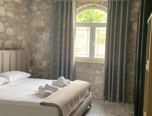 Cama o camas de una habitación en Hyka Stone House Shkoder