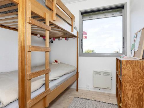 Ένα ή περισσότερα κρεβάτια σε δωμάτιο στο 5 person holiday home in Roslev-By Traum