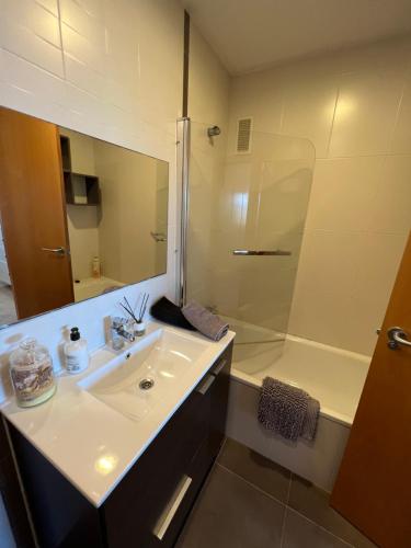 a bathroom with a sink and a shower at WONDERFUL APARTMENT IN CANET DE BERENGUER. VALENCIA in Valencia