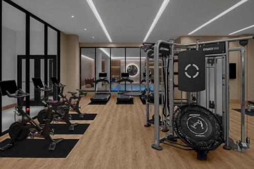 a gym with treadmills and cardio equipment in a room at The Westin Atlanta Gwinnett in Duluth