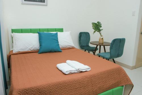 Postel nebo postele na pokoji v ubytování Amar Residence