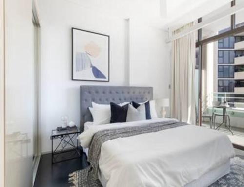 מיטה או מיטות בחדר ב-1 bedroom Apartment 437 Bourke Street