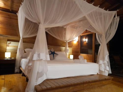 Postel nebo postele na pokoji v ubytování Casa Ocean Trancoso