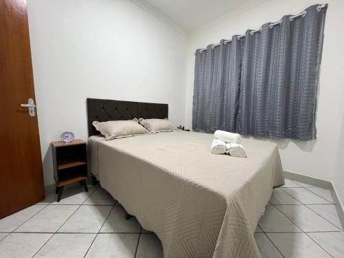 Ένα ή περισσότερα κρεβάτια σε δωμάτιο στο Apartamento Central