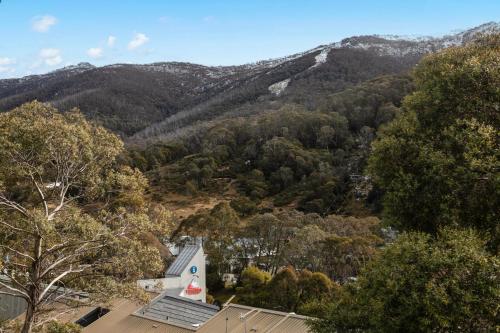 an image of a church with mountains in the background at Mowamba D5 in Thredbo