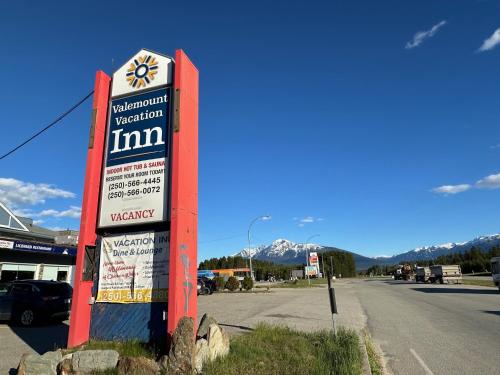 a sign on the side of a road at Valemount Vacation Inn in Valemount