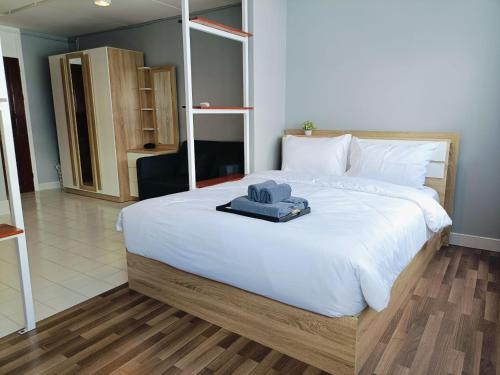 Postel nebo postele na pokoji v ubytování Impact DHIresidence at Muang Thong Thani