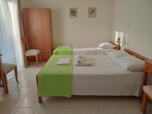 Postel nebo postele na pokoji v ubytování Tatiana`s apartments